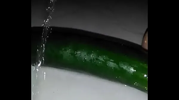Jumlah Tiub She masturbates with a cucumber until she finishes besar
