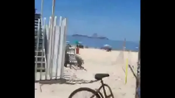 Nagy RIDING A BIKE ON THE BEACH IN RIO DE JANEIRO teljes cső