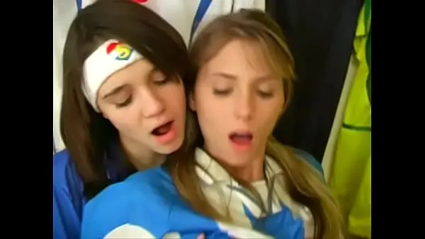 Iso Girls from argentina and italy football uniforms have a nice time at the locker room yhteensä Tube